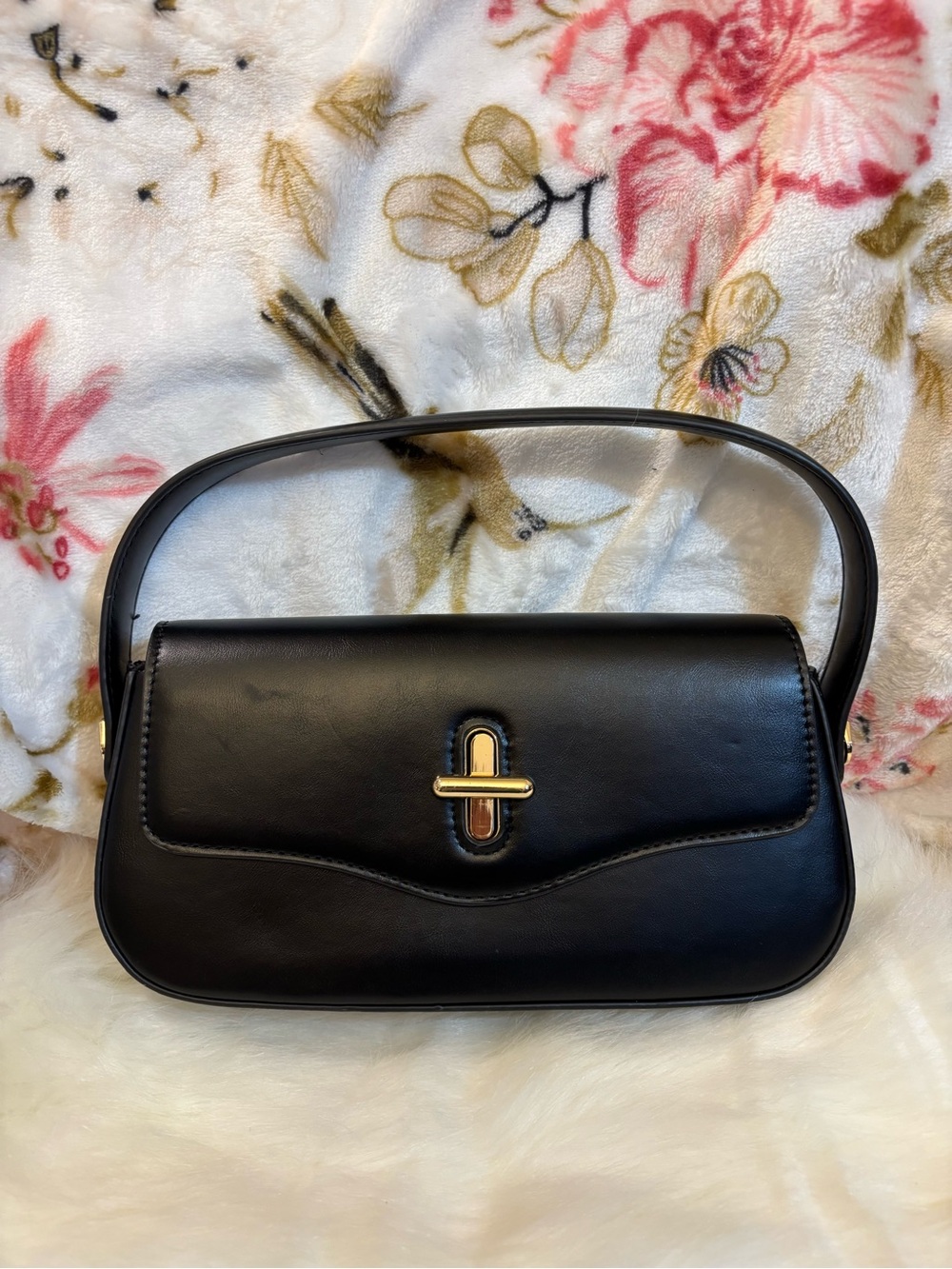 Sleek Black Shoulder Bag with Gold Turn-Lock